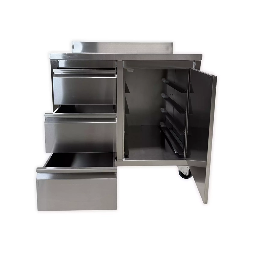 INOX tafel 3 lades + deur op wielen